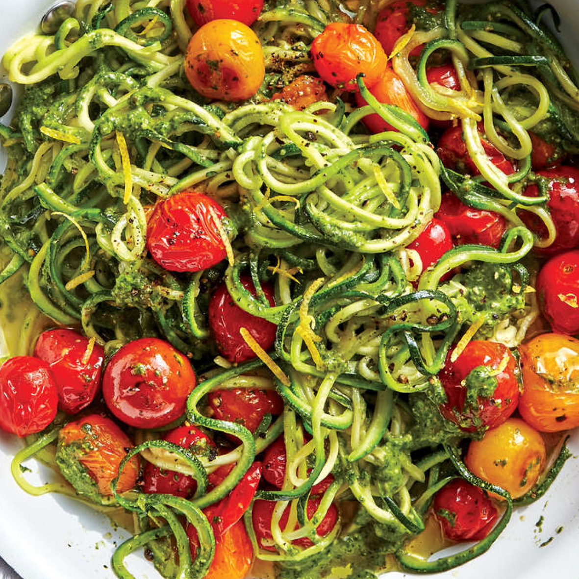 zoodles with tomatoes and spinach caper pesto.jpg