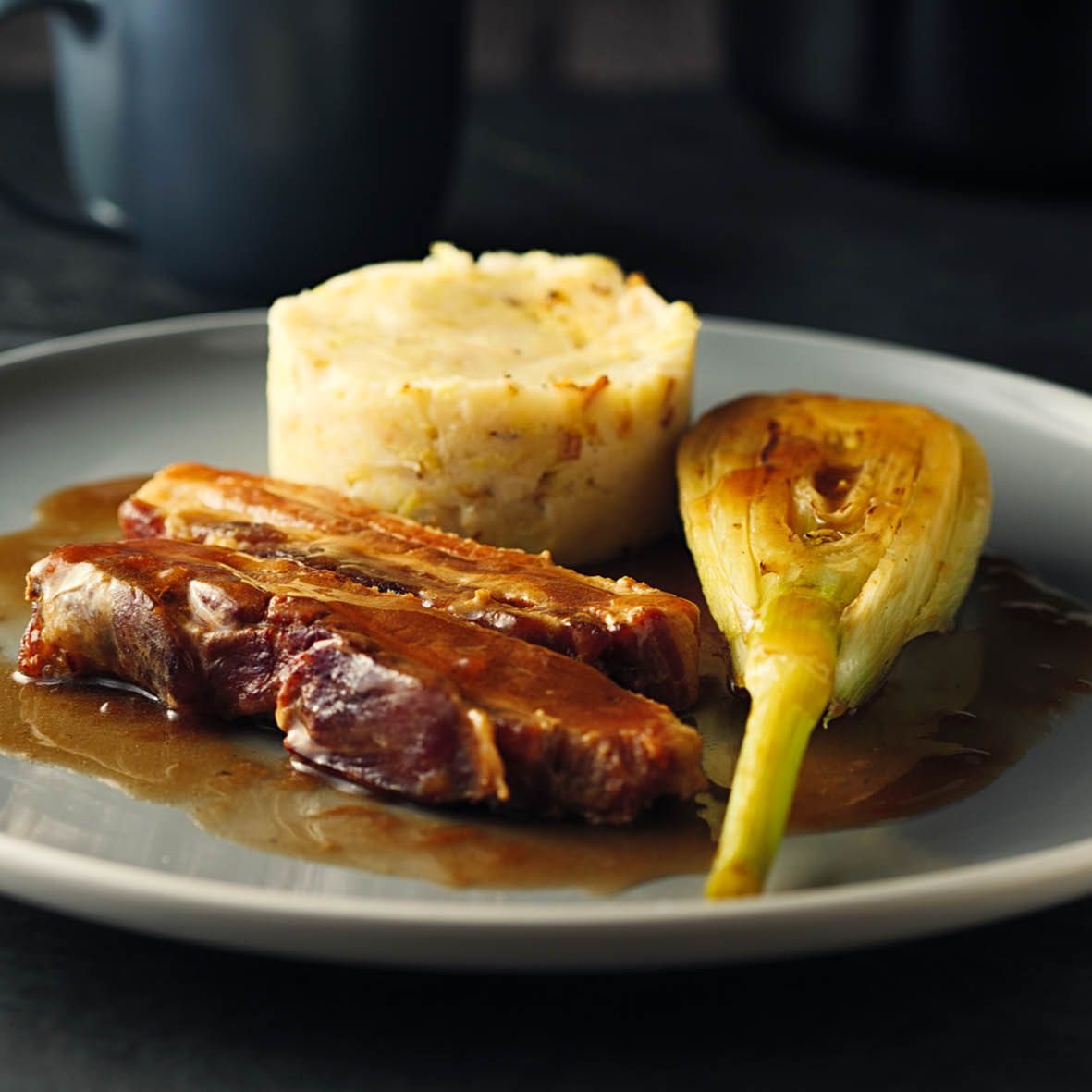 Pork Belly with Colcannon, Braised Fennel and Red Wine Reduction.jpg