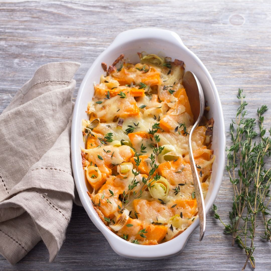 pumpkin-gratin-with-leek-thyme-and-cheese-on-a-gray-background.jpg_s=1024x1024&w=is&k=20&c=gZ49e2aT2wIkNfJQZa7sq1M4b4c7jFS4MQYANtaGUAs= (1).jpg