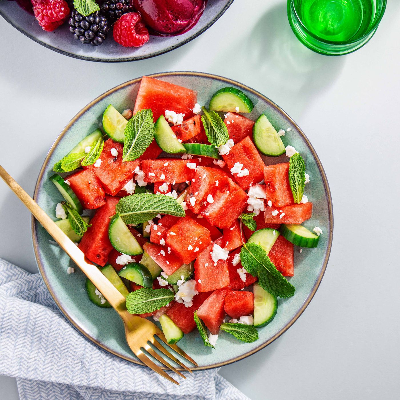 Summer-salads-with-watermelon-and-cucumbers,-berries-and-ice-cream-1158288528_5755x3837-square.jpg