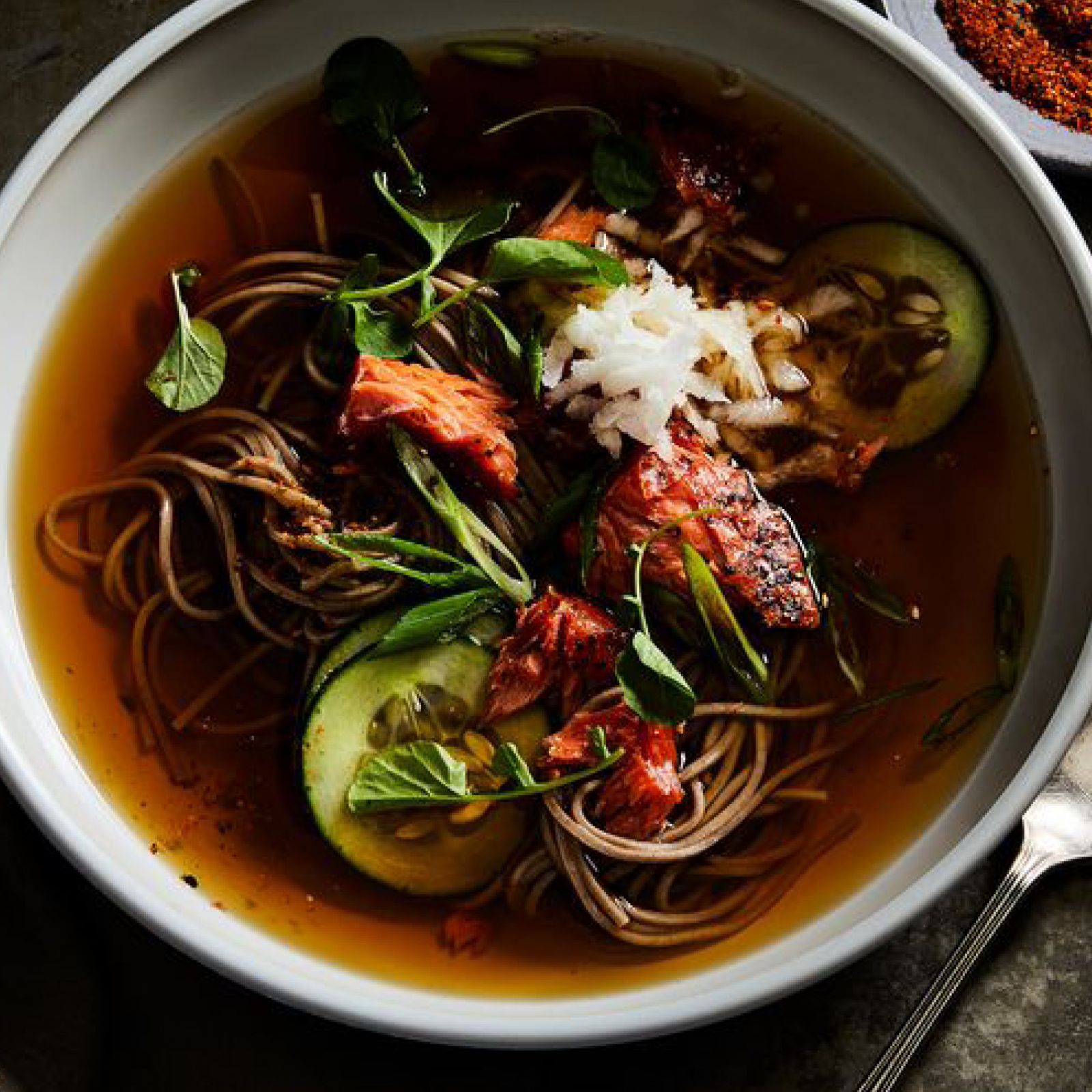 Hot soba noodle soup with salmon,cucumber and tagarashi.jpg