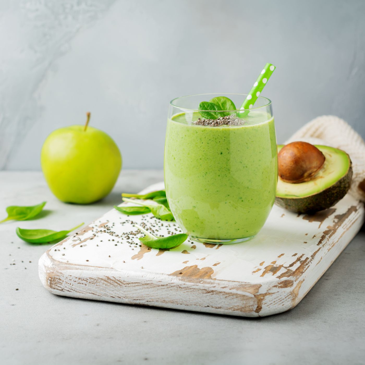 Vegetarian-healthy-green-smoothie-from-avocado,-spinach-leaves,-apple-and-chia-seeds-on-gray-concrete-background.-Selective-focus.-Space-for-text.-984772004_3869x2579 square.jpeg