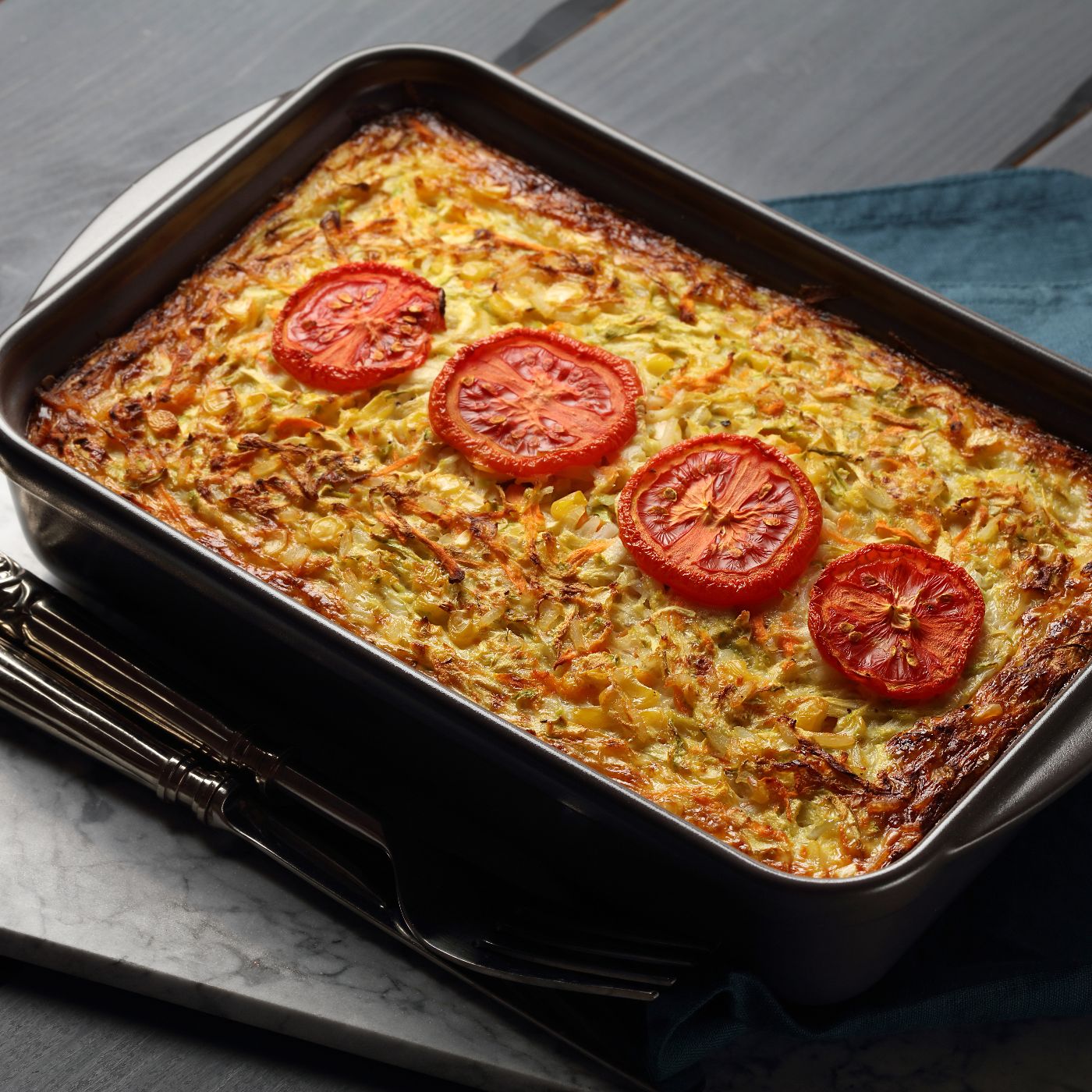 Home-made-Vegetarian-casserole-with-cabbage,-carrot,-garlic,-corn,-rice-and-tomatoes-1187418979_8660x5773 copy.jpeg