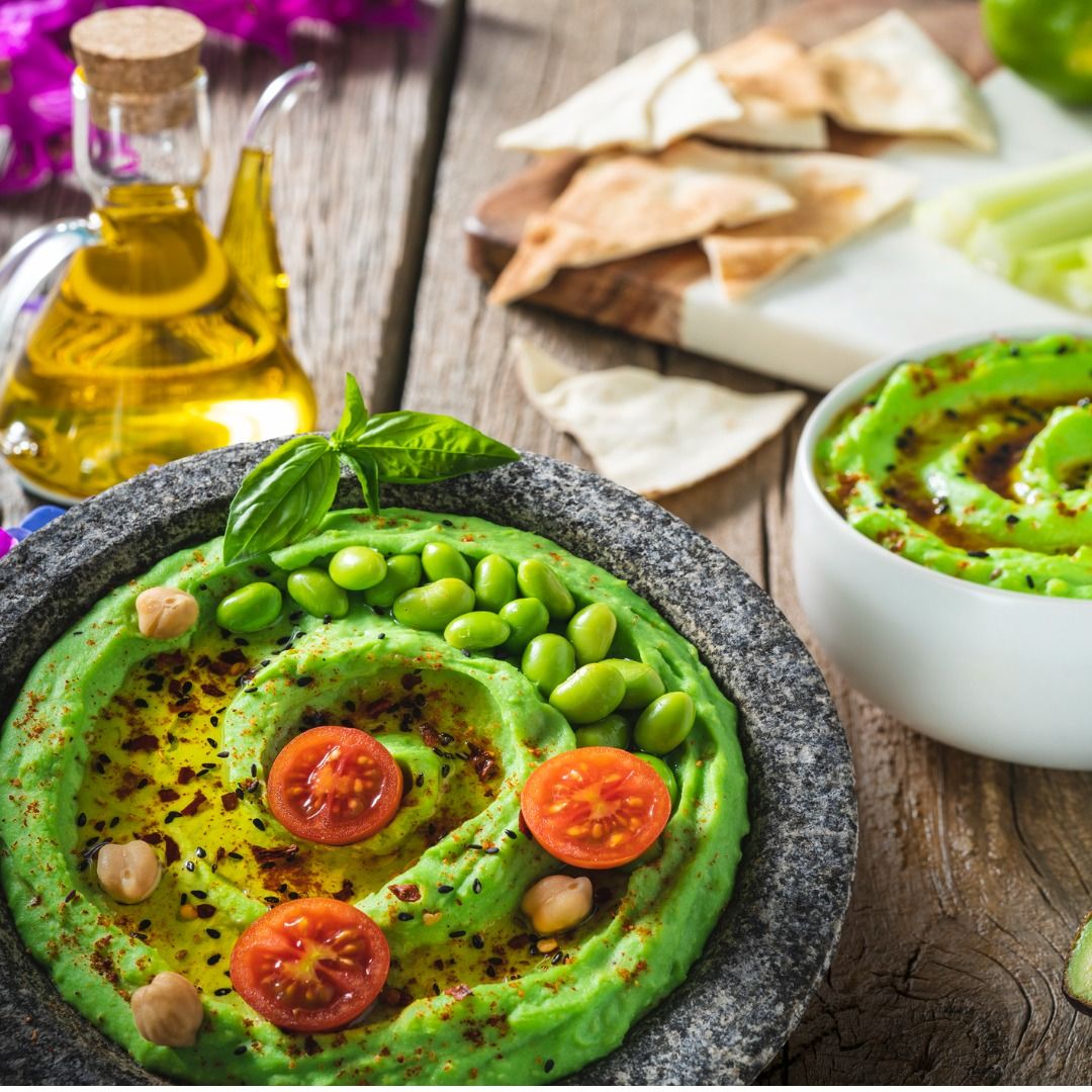 avocado-and-edamame-hummus-recipe-with-olive-oil-and-ingredients-picture-id1330509436.jpg