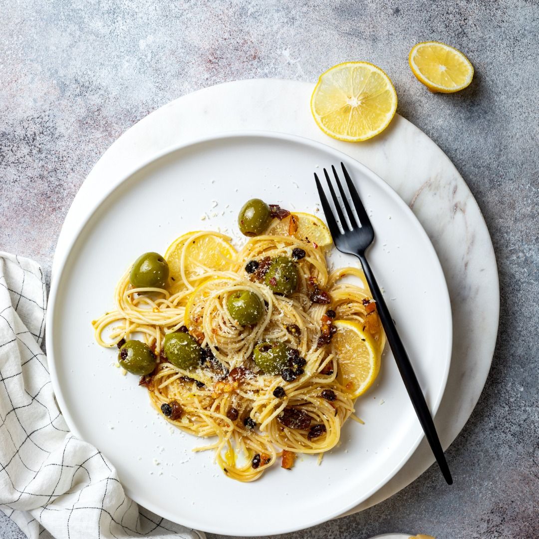 italian-pasta-cacio-e-pepe-spaghetti-mixed-with-grated-cheese-green-picture-id1206492300.jpg