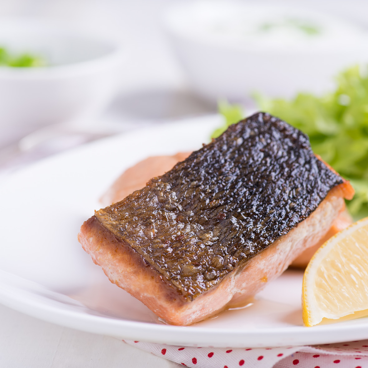 Seared Huon Salmon with zucchini noodles (zoodles), mint and hazelnuts