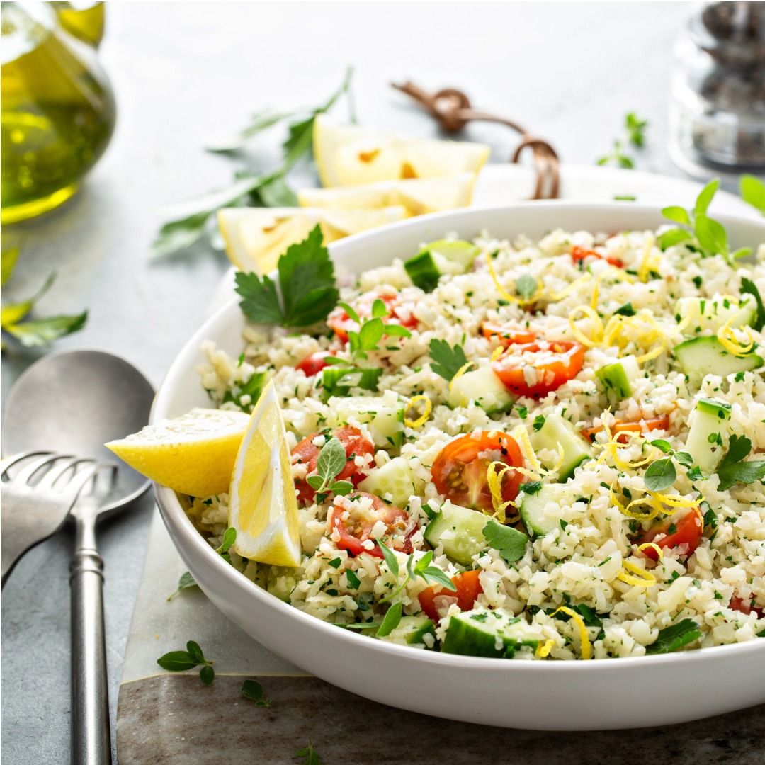 tabbouleh-salad-with-cauliflower-rice-and-vegetables-picture-id1351168781.jpg