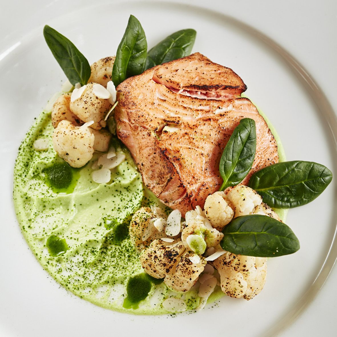 Fillet of salmon with green pea cream and scorched cauliflower.jpg