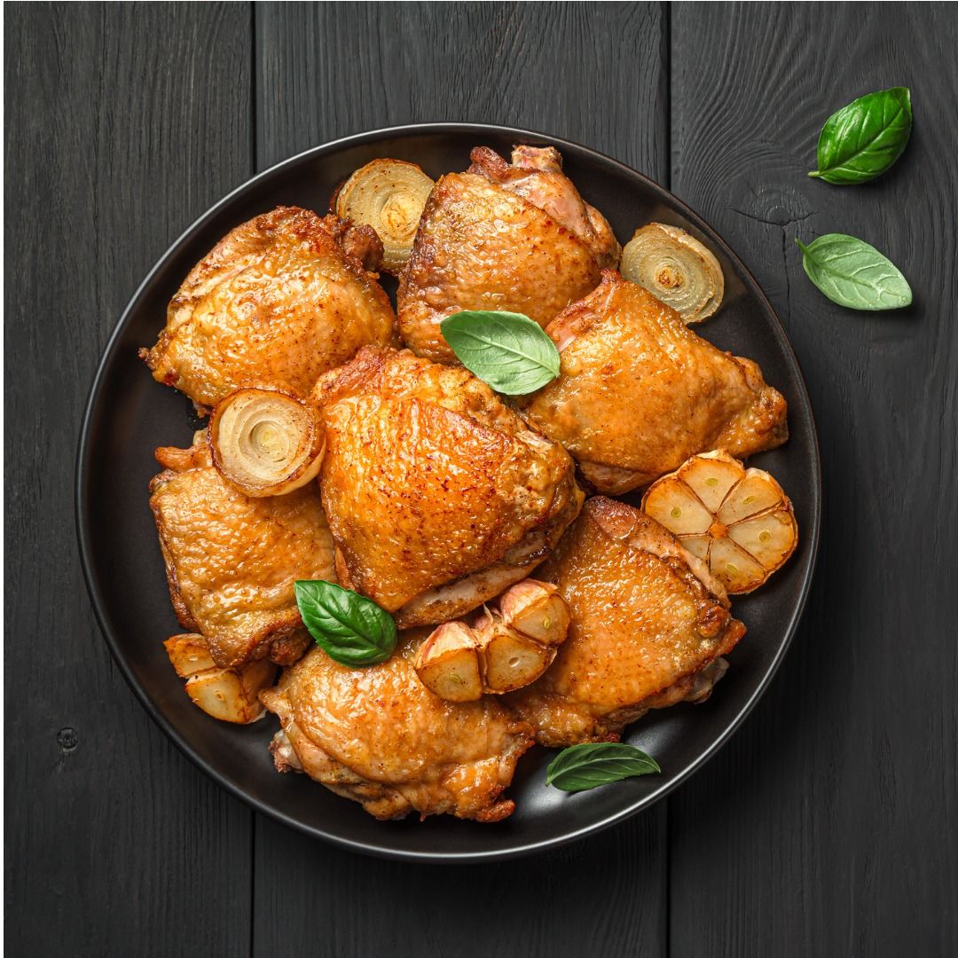 chicken-thighs-with-fried-onions-garlic-and-fresh-basil-on-a-black-background.jpg_s=1024x1024&w=is&k=20&c=CUvE2JiwbuNpkwDct4I2ZSmNT6TbDk5m-mBqlJJ2eik=.jpg