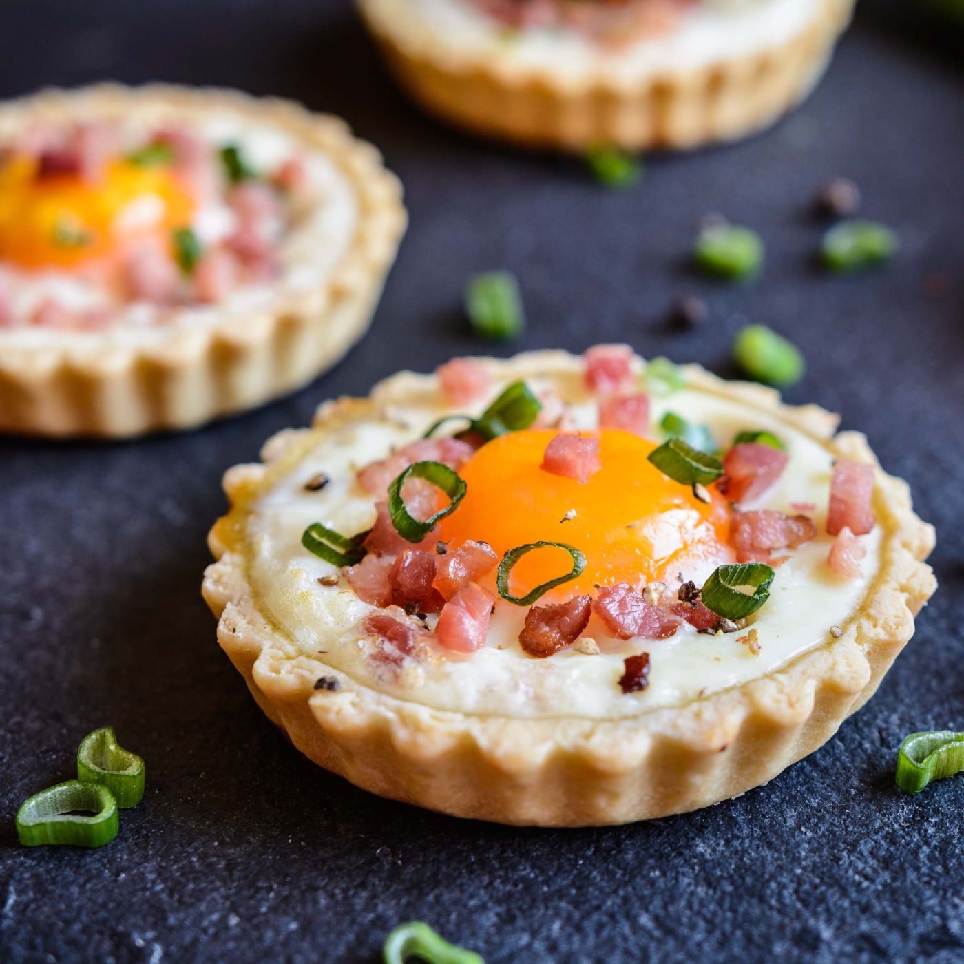 Baked-egg-and-bacon-tartlets-802449408_3903x2556 square.jpeg