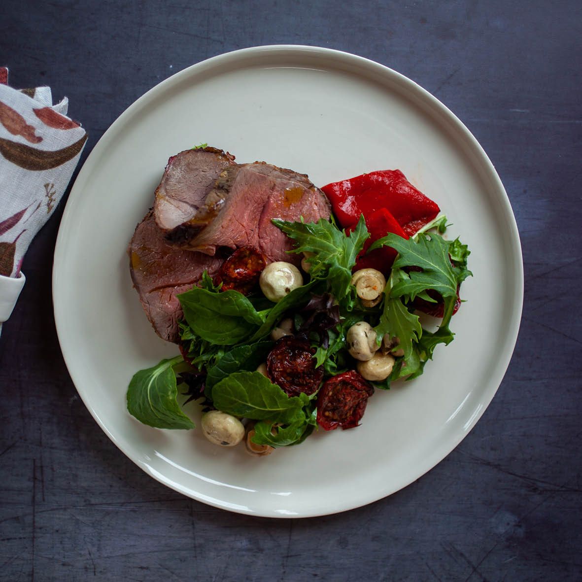 Leg of Lamb with Sumac Roasted Tomato Salad.jpg