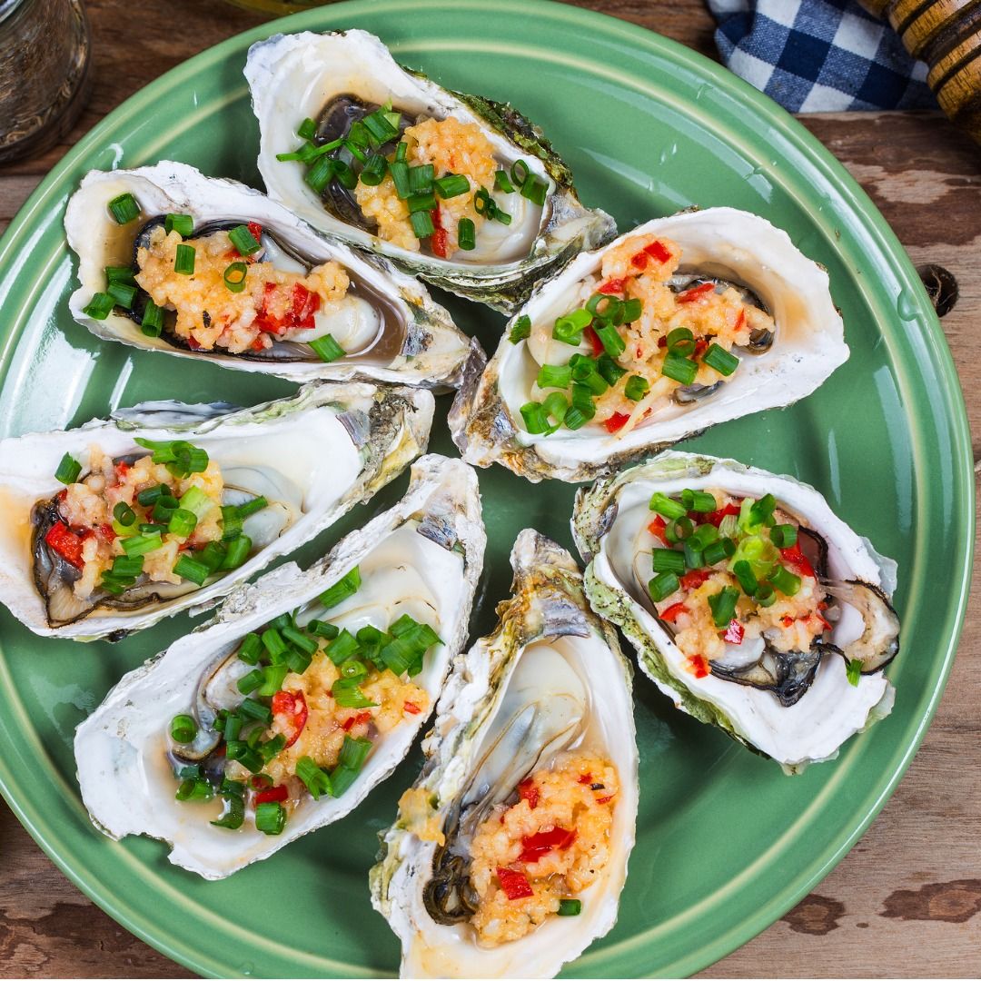 roast-oysters-plate-picture-id973604224.jpg