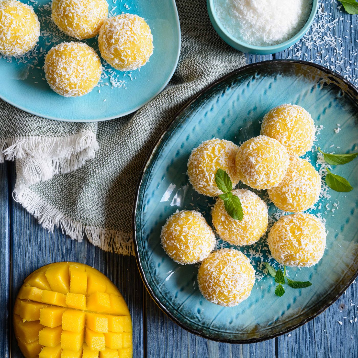 Mango-Coconut-Ladoo--sweet-balls-made-of-mango-puree,-desiccated-coconut-and-condensed-milk-1253126248_6000x4000 square.jpg